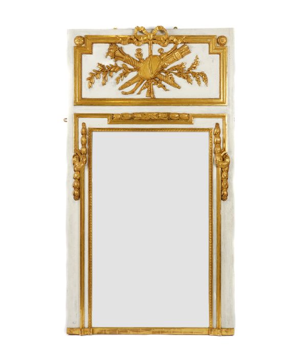 A WHITE PAINTED PARCEL GILT TRUMEAU WALL MIRROR