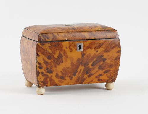 AN EARLY 19TH CENTURY BLONDE TORTOISESHELL RECTANGULAR TEA CADDY