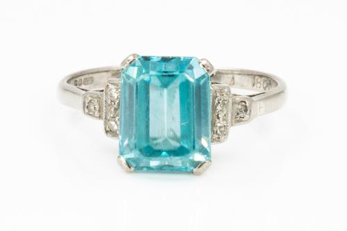 AN 18CT WHITE GOLD, BLUE ZIRCON AND DIAMOND RING