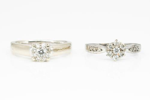 TWO WHITE GOLD AND DIAMOND CLUSTER RINGS (2)