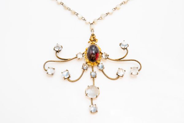 A CARBUNCLE GARNET AND MOONSTONE PENDANT WITH AN ASSOCIATED MOTHER-OF-PEARL NECKLACE