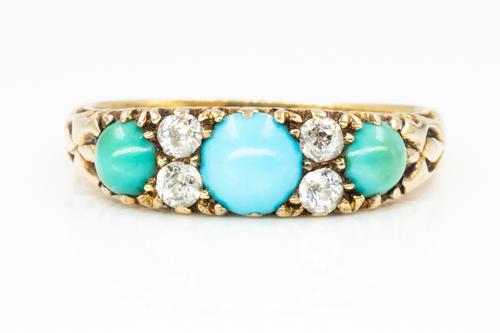 A GOLD, TURQUOISE AND DIAMOND RING