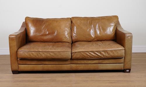 A TAN LEATHER SQUARE BACK TWO SEAT SOFA