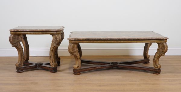 A MARBLE TOPPED SERPENTINE SHAPED COFFEE TABLE ON POLYCHROME PAINTED FAUX MARBLE BASE  (2)