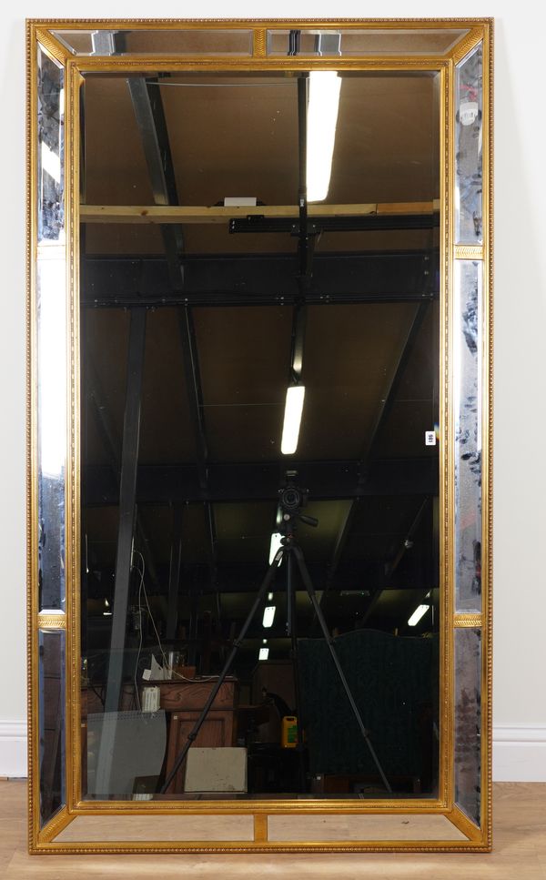 A GOLD PAINTED RECTANGULAR MARGINAL WALL MIRROR