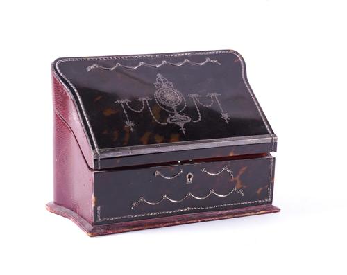 AN EDWARDIAN SILVER INLAID AND MOUNTED TORTOISESHELL VENEERED STATIONERY BOX