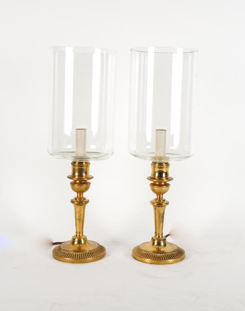 A PAIR OF GEORGE I STYLE GILT-BRASS CANDLESTICK TABLE LAMPS WITH STORM SHADES (2)