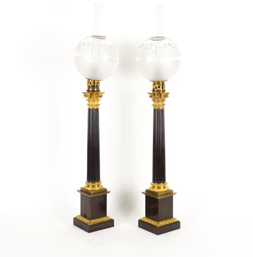 A PAIR OF FRENCH GILT AND PATINATED METAL CORINTHIAN COLUMN TABLE LAMPS (2)