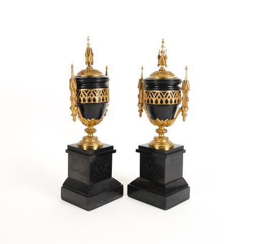 A PAIR OF GOTHIC STYLE GILT BRONZE MOUNTED POLISHED BELGIUM BLACK MARBLE ORNAMENTAL URNS (2)