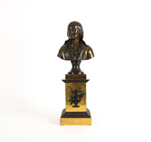 A FRENCH RESTAURATION PATINATED BRONZE BUST OF A FRENCH PHILOSOPHER, POSSIBLY ROUSSEAU