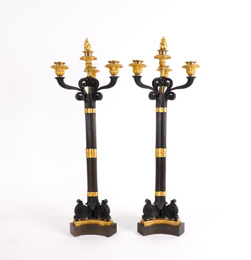 A PAIR OF RESTAURATION STYLE GILT AND PATINATED BRONZE FOUR LIGHT CANDELABRA (2)