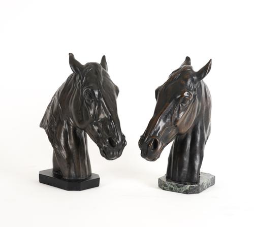 A NEAR PAIR OF COMPOSITE BRONZE HORSE HEADS AFTER A MODEL BY ALBERT HINRICH HUSSMANN (2)