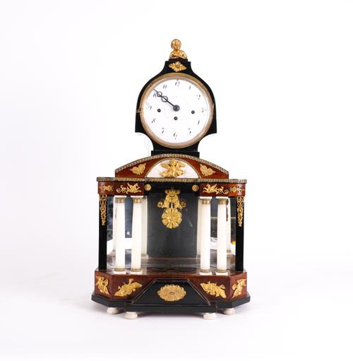 AN AUSTRIAN ORMOLU MOUNTED WALNUT AND WHITE MARBLE ARCHITECTURAL QUARTER STRIKING MANTEL CLOCK