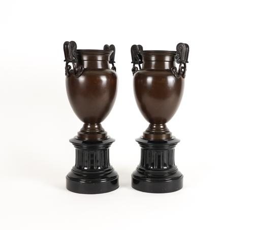A PAIR OF ETRUSCAN STYLE PATINATED BRONZE URNS  (2)