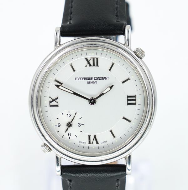 A FREDERIQUE CONSTANT GENEVE STEEL CIRCULAR CASED GENTLEMAN'S WRISTWATCH