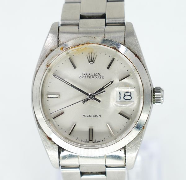 A ROLEX OYSTER DATE PRECISION GENTLEMAN'S STEEL BRACELET WRISTWATCH