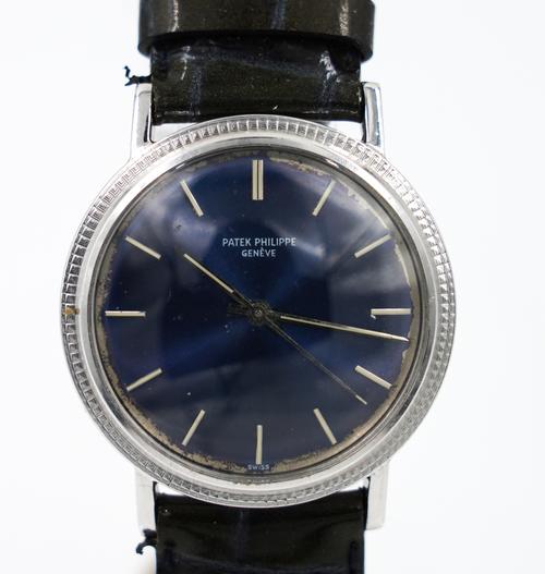 PATEK-PHILLLIPE. AN 18K WHITE GOLD AUTOMATIC WRISTWATCH