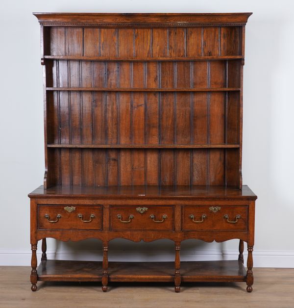 AN 18TH CENTURY OAK THREE DRAWER POT BOARD DRESSER