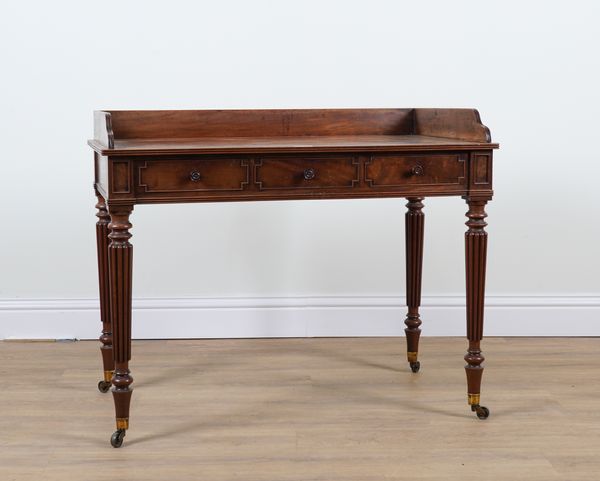 GILLOWS LANCASTER;  AN EARLY 19TH CENTURY MAHOGANY GALLERIED THREE DRAWER WRITING TABLE