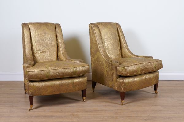 DUDGEON LONDON; A PAIR OF FLORAL PATTERN GOLD UPHOLSTERED SQUARE BACK EASY ARMCHAIRS (2)