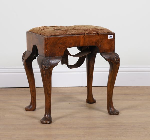 A QUEEN ANNE STYLE WALNUT FOOTSTOOL