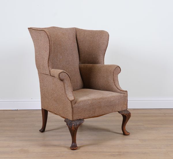 A GEORGE II STYLE MAHOGANY FRAMED WINGBACK ARMCHAIR