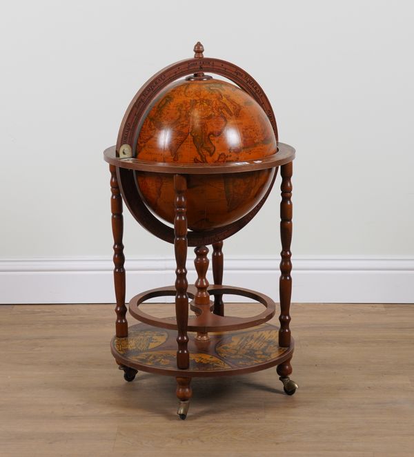 A 20TH CENTURY LIFT TOP GLOBE DRINKS CABINET