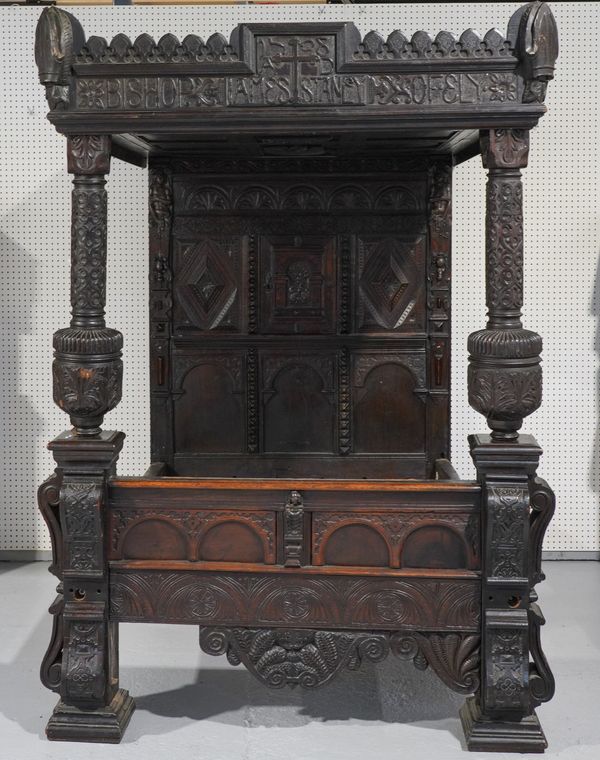 AN OAK FOUR POSTER BED WITH PANELLED CANOPY AND HEADBOARD