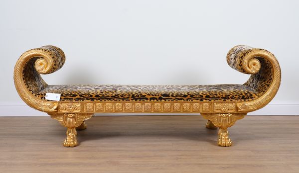 AN EGYPTIAN REVIVAL GILT FRAMED LEOPARD PRINT UPHOLSTERED SCROLL END SOFA