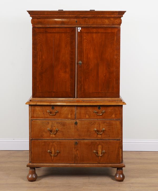 A GEORGE I WALNUT CABINET ON STAND