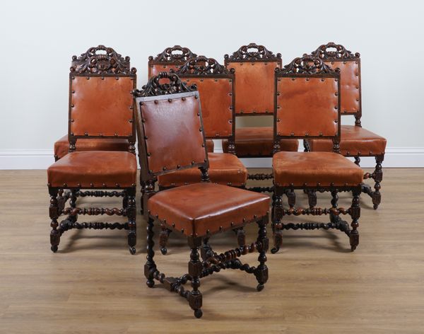 A SET OF EIGHT VICTORIAN CARVED OAK DINING CHAIRS (8)