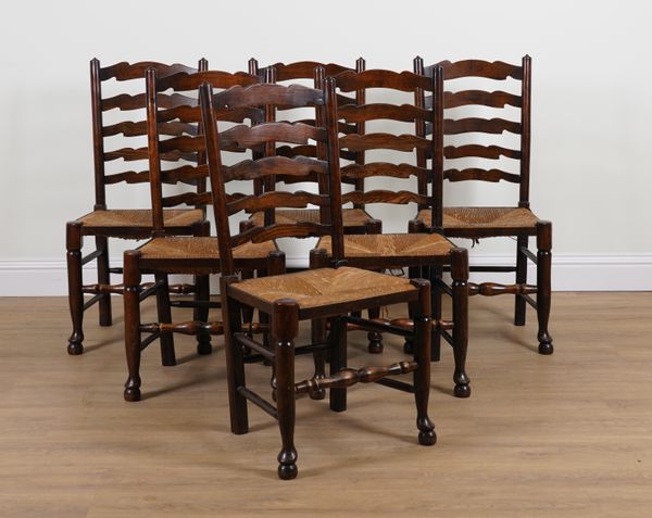 A SET OF SIX ASH LADDER BACK DINING CHAIRS (6)