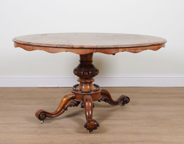 A VICTORIAN WALNUT OVAL SNAP TOP LOO TABLE