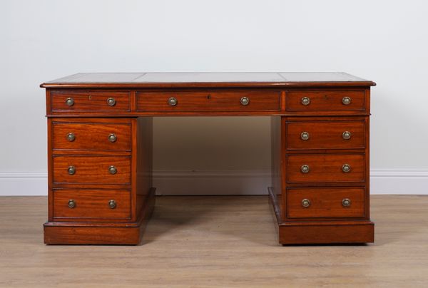 A 19TH CENTURY MAHOGANY NINE DRAWER PEDESTAL DESK