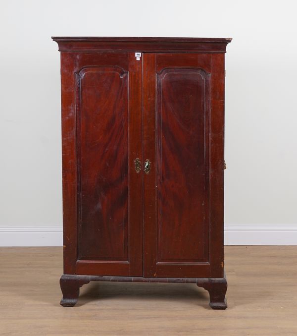 AN EDWARDIAN MAHOGANY TWO DOOR SIDE CUPBOARD