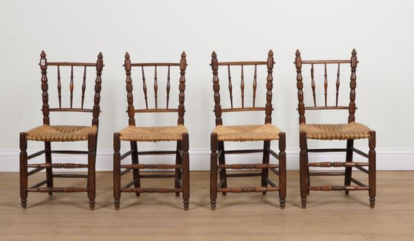 A SET OF FOUR 19TH CENTURY CONTINENTAL FRUITWOOD SPINDLE BACK DINING CHAIRS (4)