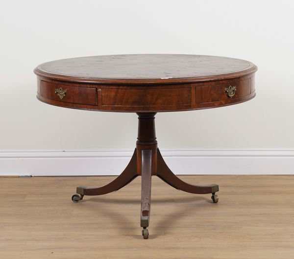 A REGENCY MAHOGANY DRUM TABLE