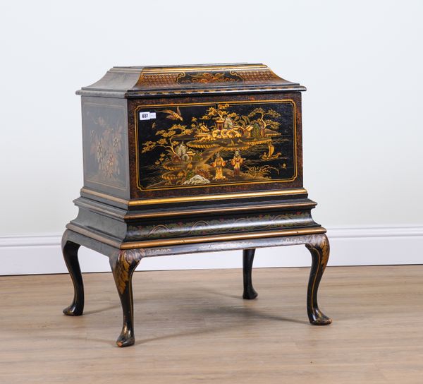 AN EARLY 20TH CENTURY BLACK LACQUER CHINOISERIE DECORATED LIFT TOP CHEST ON STAND