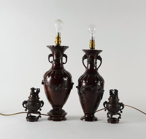 A PAIR OF JAPANESE BRONZE TWO-HANDLED VASES ADAPTED AS LAMPS  (6)