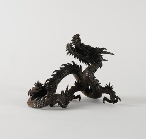 A JAPANESE BRONZE MODEL OF A DRAGON