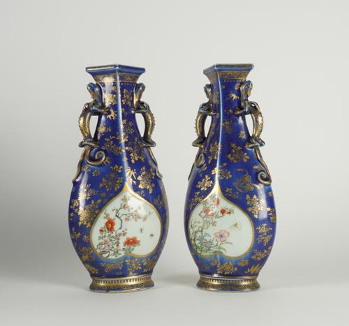 A PAIR OF CHINESE BLUE-GROUND AND GILT FAMILLE ROSE  TWO-HANDLED VASES (4)