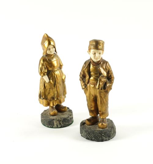 IN THE MANNER OF JOSEPH D'ASTE (ITALIAN 1881-1945): TWO BRONZE AND IVORY FIGURES OF A BOY AND A GIRL (2)