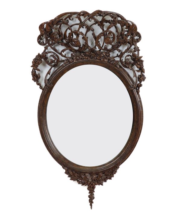 A 19TH CENTURY STYLE MOULDED RESIN OVAL MIRROR