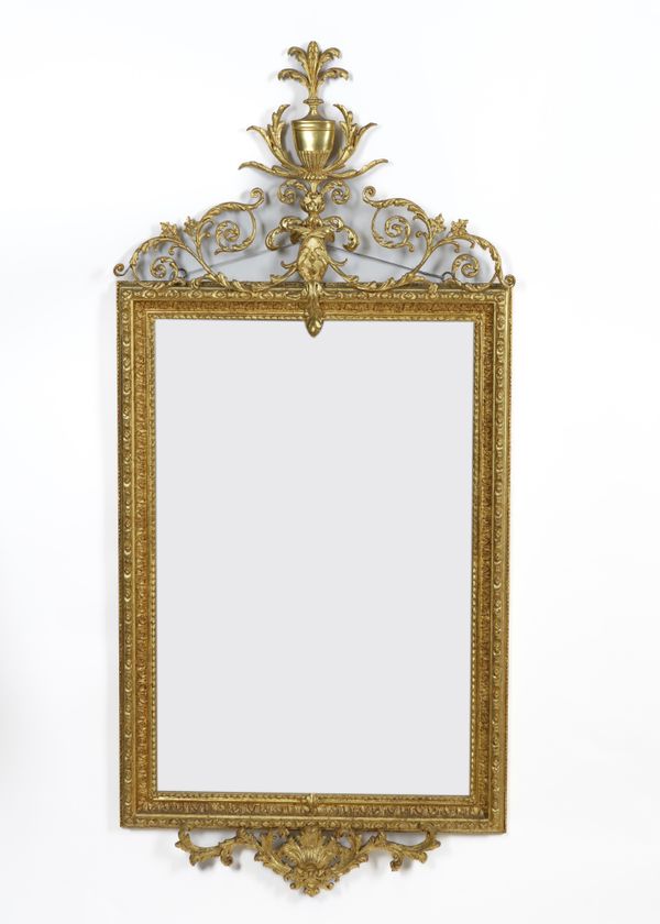 A LATE 19TH CENTURY NEOCLASSICAL REVIVAL GILT FRAMED MIRROR WITH URN CREST AND MOULDED FRAME