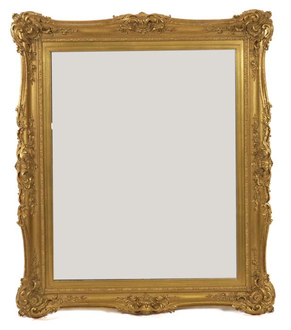 A VICTORIAN STYLE GILT FRAMED RECTANGULAR WALL MIRROR