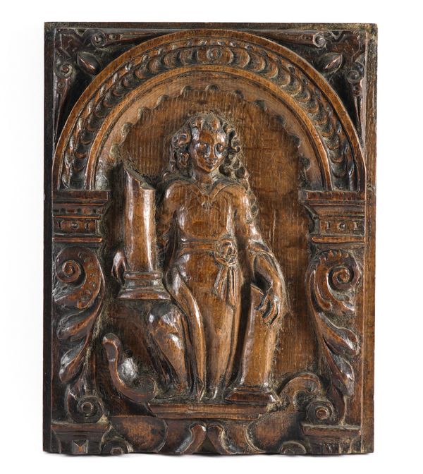 A NORTH EUROPEAN RELIEF CARVED OAK ALLEGORICAL PANEL REPRESENTING FORTITUDE