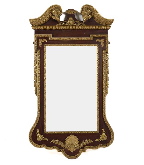 A GEORGE II STYLE PARCEL GILT MAHOGANY WALL MIRROR