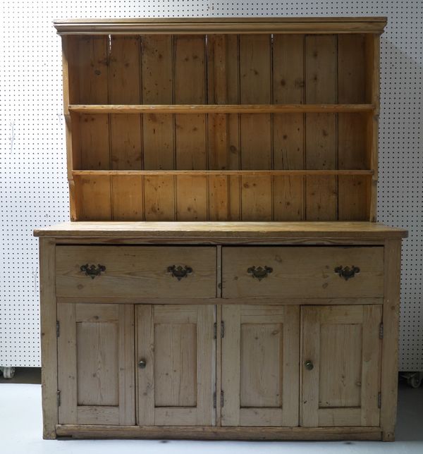 A LATE VICTORIAN PINE KITCHEN DRESSER