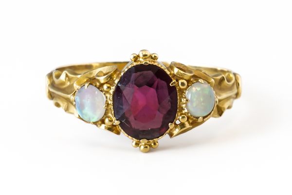 A GARNET AND OPAL RING