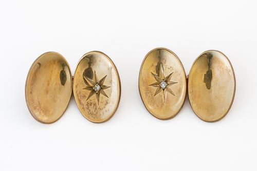 A PAIR OF 9CT GOLD AND DIAMOND CUFFLINKS (2)